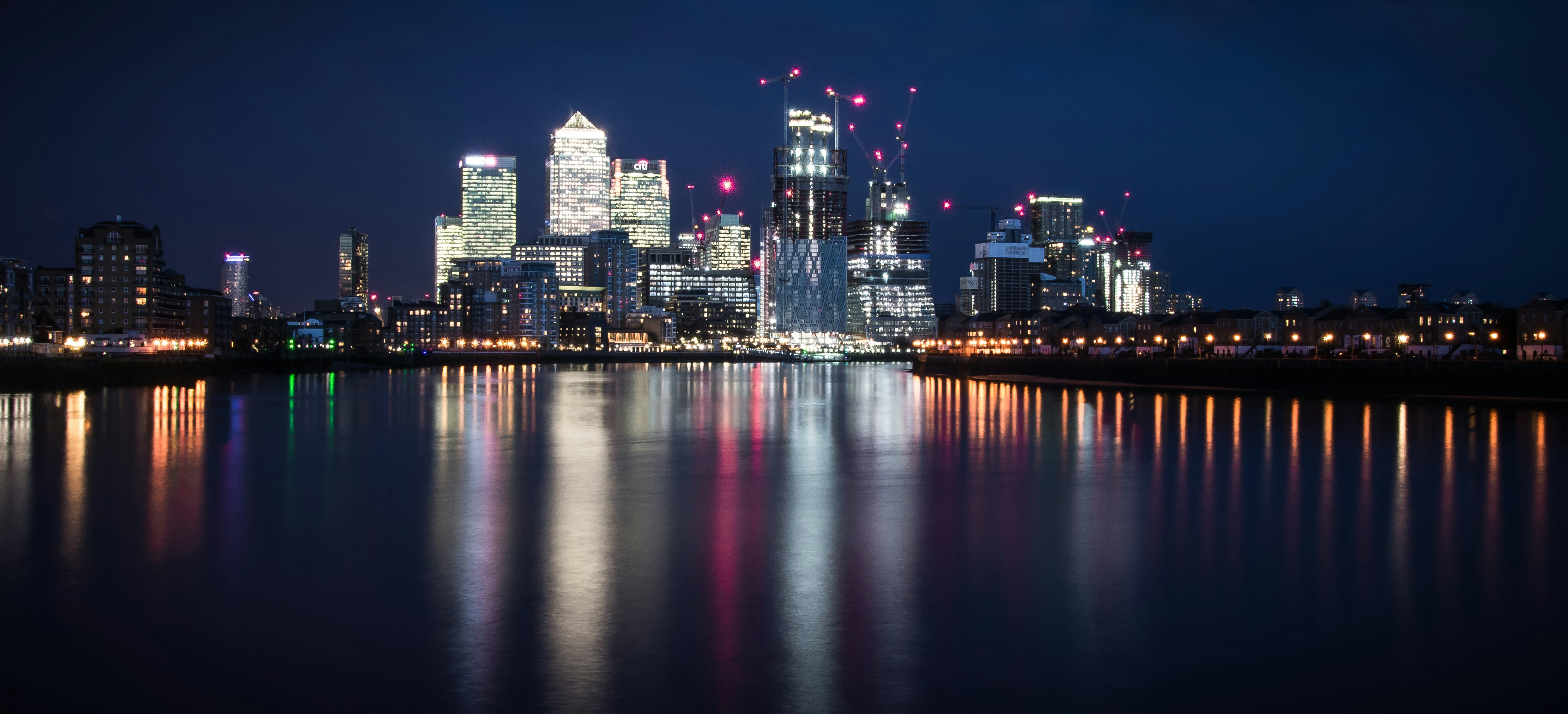 Canary Wharf at night, London — headquarters of Silk Route Holding